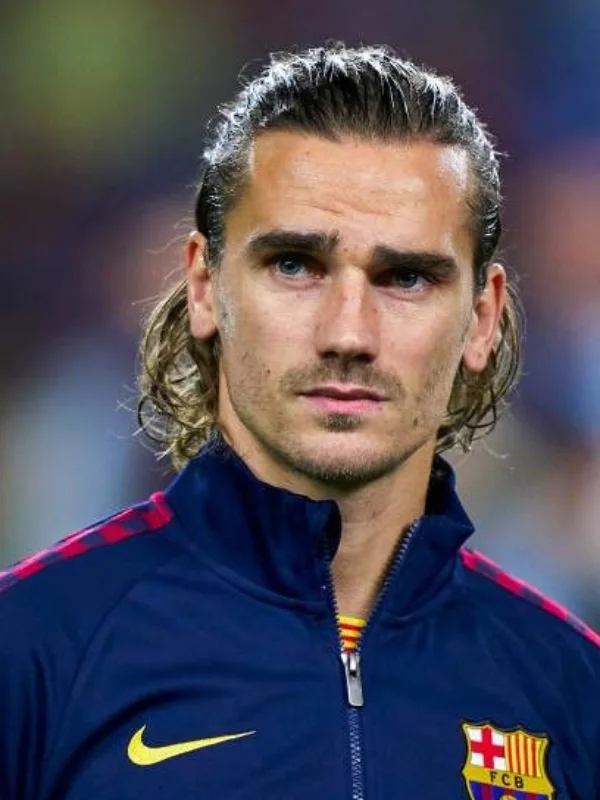 29 Trending Soccer Player Haircuts for a Sporty Look 6 Antoine Griezmann Haircut_ Long Shaggy Waves