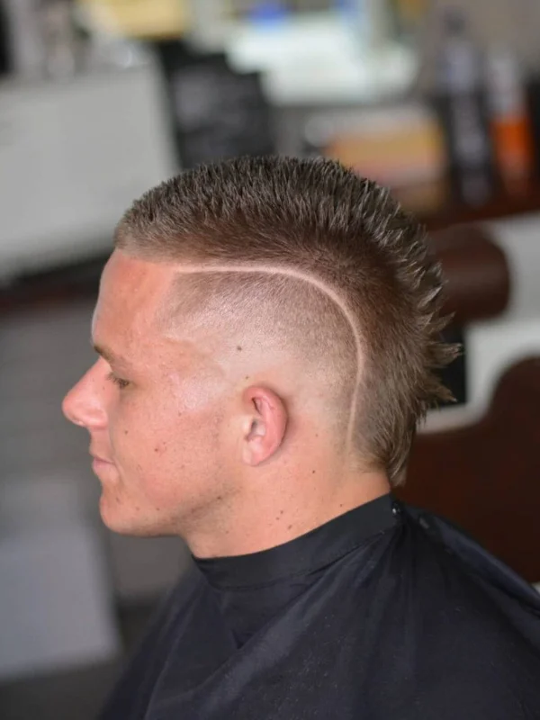 30 Cool Haircut Designs: Creative Ideas for Bold Looks 10 Burst Fade Mohawk with Long Shaved Lines