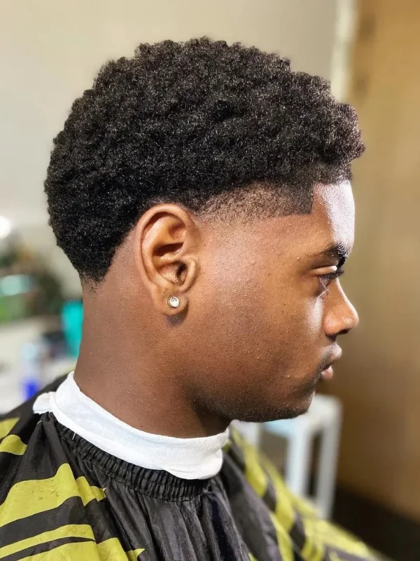 55 Trending Low Taper Fade Haircuts for Men 52 Cropped Afro with a Low Taper