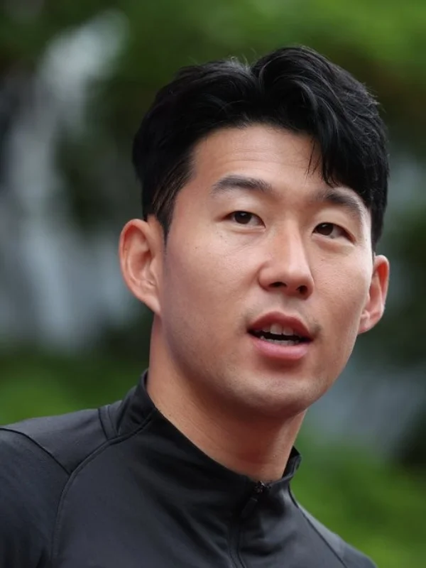 29 Trending Soccer Player Haircuts for a Sporty Look 17 Son HeungMin Haircut: Curtain Bangs