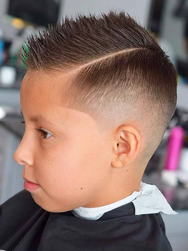 35 Cool & Stylish Kids Boy Haircuts 29 Faux Hawk Fade