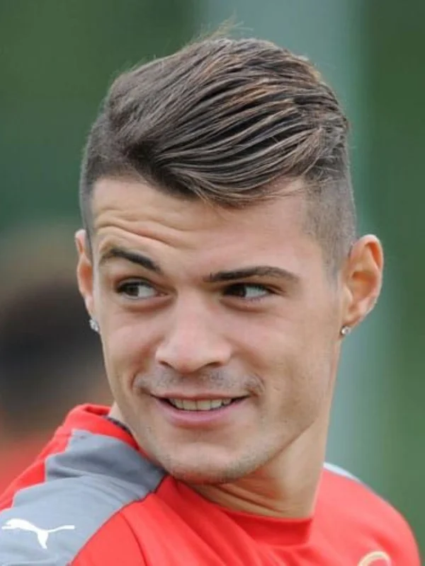 29 Trending Soccer Player Haircuts for a Sporty Look 19 Granit Xhaka – Side Part Fade