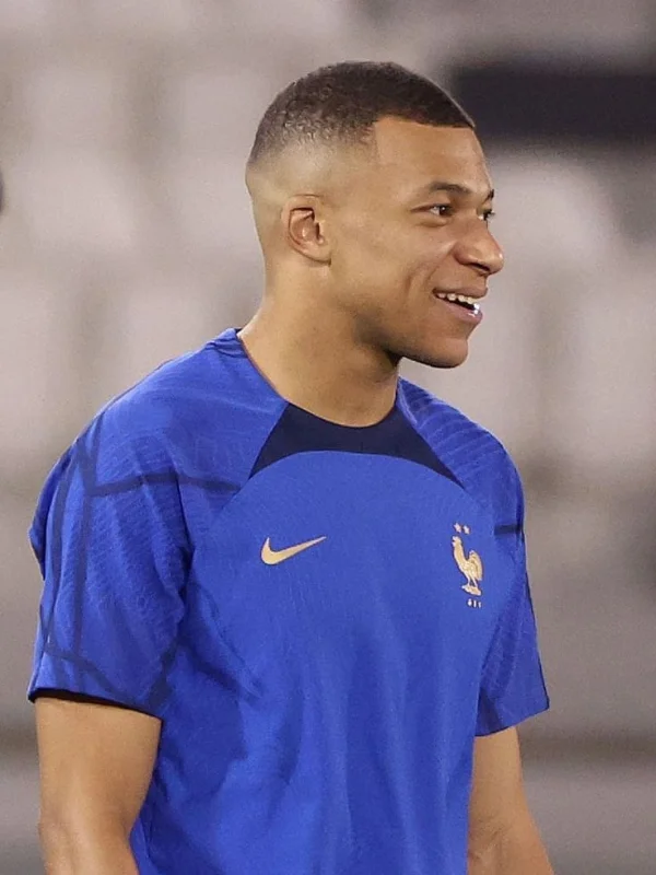 29 Trending Soccer Player Haircuts for a Sporty Look 5 Kylian Mbappe Haircut_ Buzz Cut