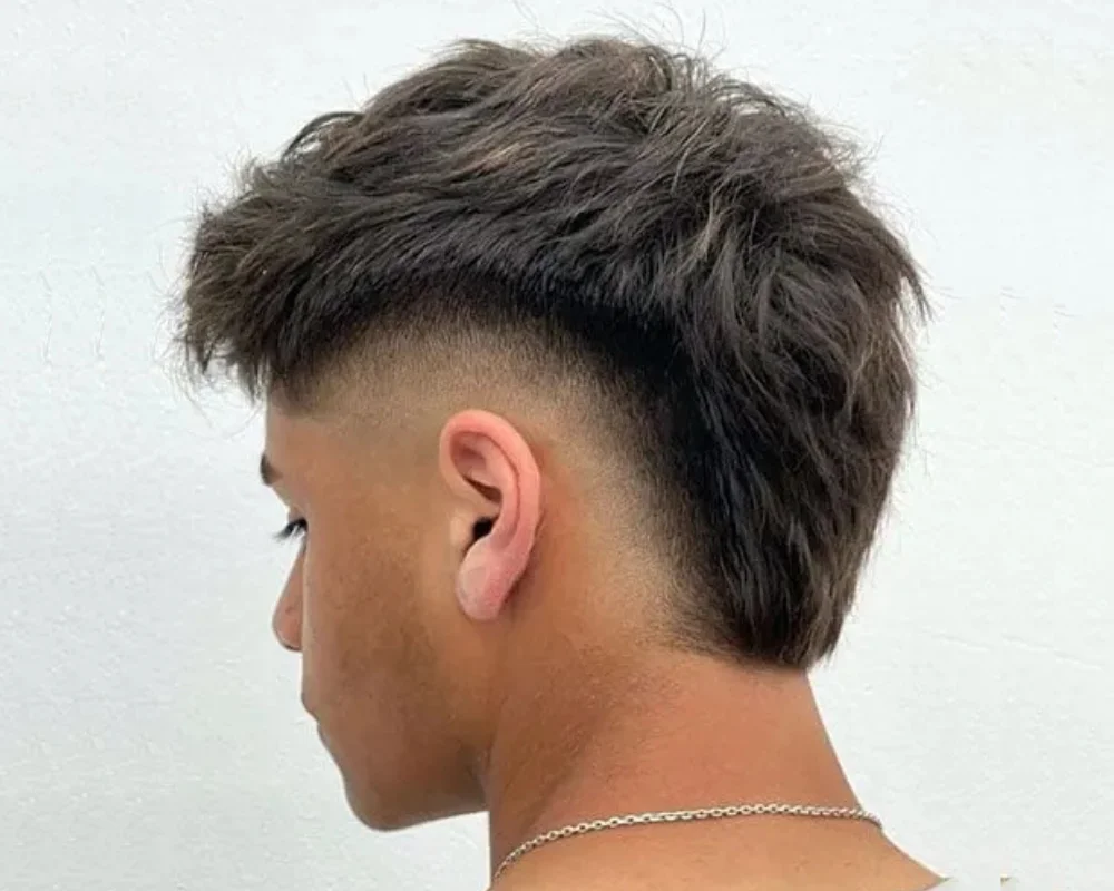 Boys Haircuts: 40 Cool & Stylish for Every Personality 15 Layered Mohawk with Fade