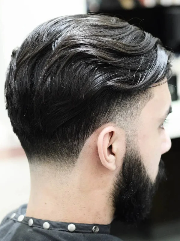 Undercut Fade: 17 Trending Haircut Variations for Men 9 Long Hair with Low Taper Fade Undercut