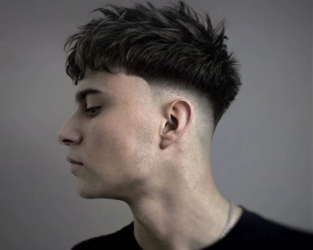 Boys Haircuts: 40 Cool & Stylish for Every Personality 37 Low Fade with Textured Fringe