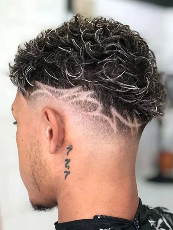 30 Cool Haircut Designs: Creative Ideas for Bold Looks 15 Low Skin Fade with Freestyle