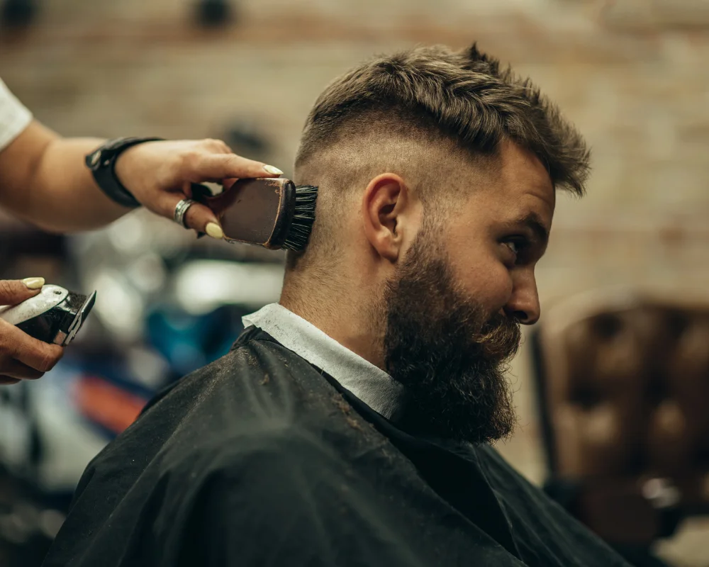 Mid Fade Haircut: 30 Stylish & Trendy Variations 16 Mid Fade with Brushed Forward Waves