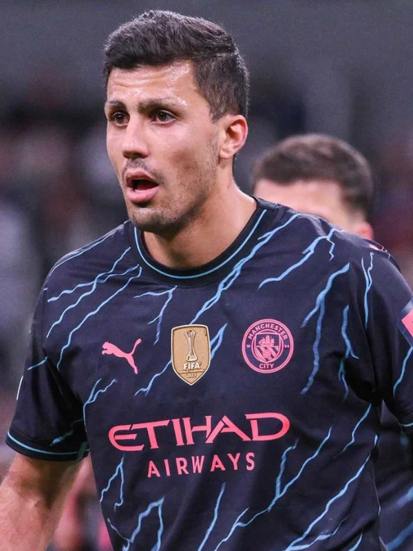 29 Trending Soccer Player Haircuts for a Sporty Look 29 Rodri – Textured Ivy League with Tapered Sides
