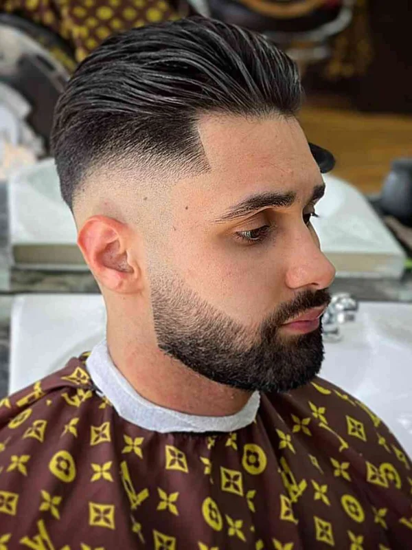 Low Fade Haircut: 30 Classy, Stylish Looks for Men 31 Thick Textured Brush Back with Low Bald Fade