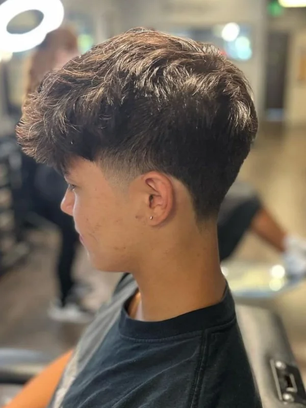 35 Cool & Stylish Kids Boy Haircuts 32 Thick Textured Fringe with Low Fade