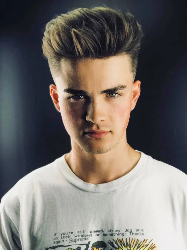 35 Cool Haircuts for Teenage Guys – Trendy & Fresh Styles 28 Trendy Blowout with Clean Mid-Cut Taper