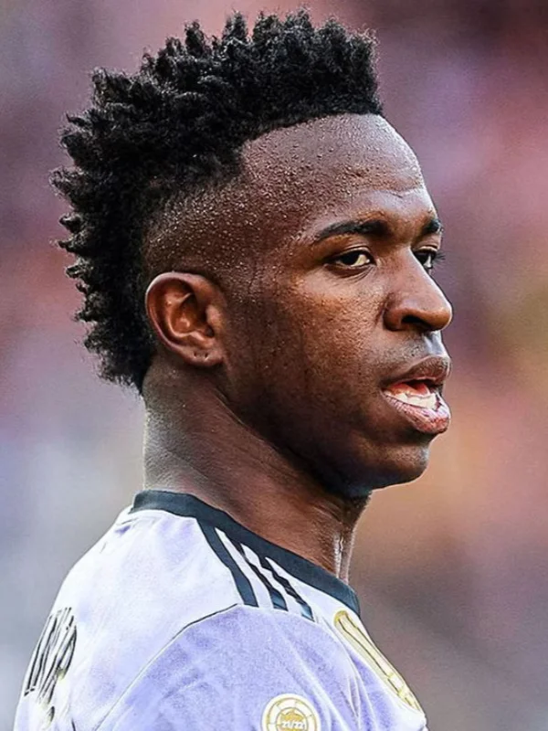 29 Trending Soccer Player Haircuts for a Sporty Look 30 Vinicius Jr. – Kinky Afro Curls with High Skin Fade