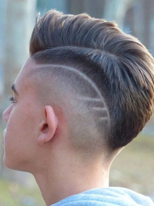 30 Cool Haircut Designs: Creative Ideas for Bold Looks 20 Wavy Spiky Fade with Thick Shaved Stripes
