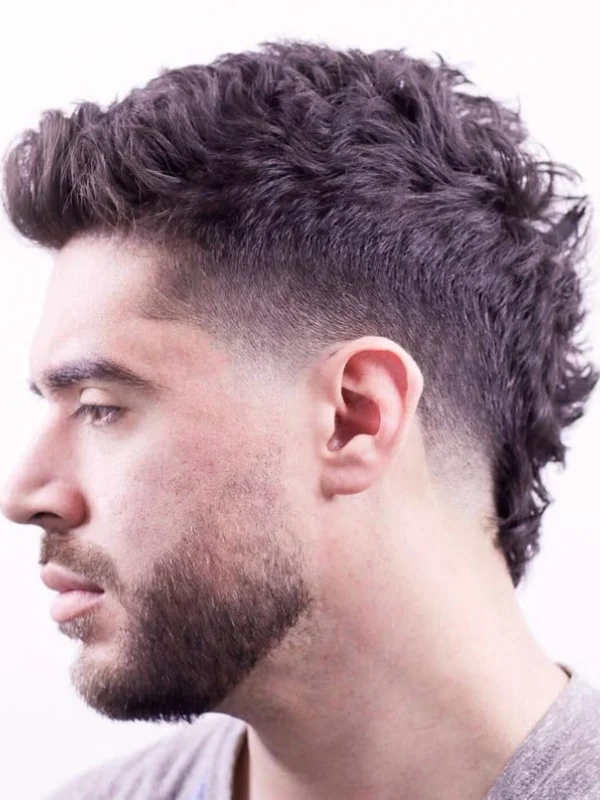 Burst Fade Haircut: 27 Stylish Examples 25 Disheveled Mohawk Taper Fade