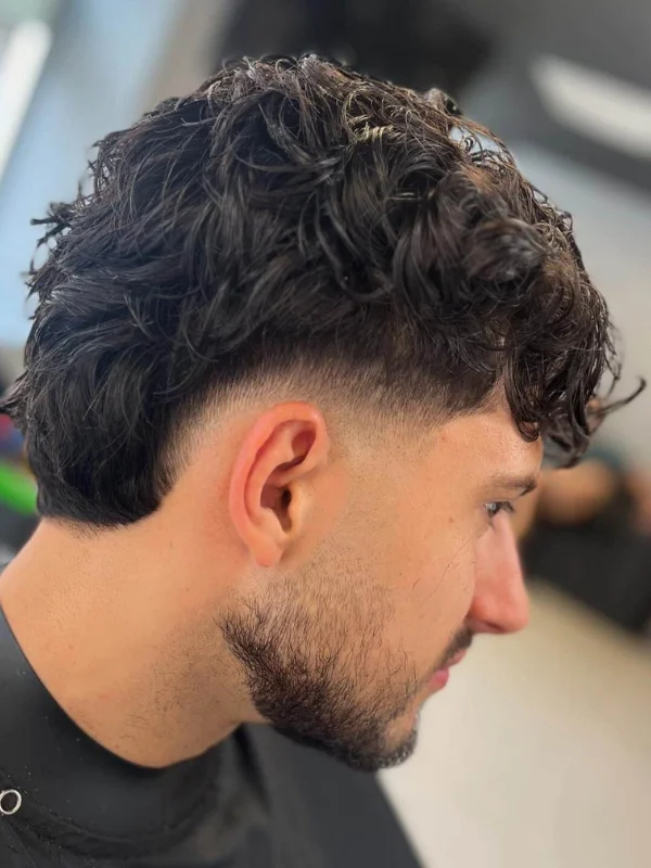 Burst Fade Haircut: 27 Stylish Examples 21 Low Burst Fade with Thick, Messy Waves
