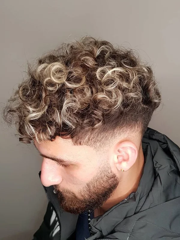Low Taper Fade with Curls: 20 Fresh Style Ideas for Men 18 Low Taper Fade with Highlighted Curls