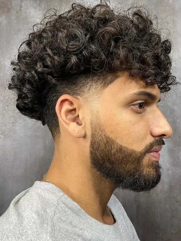 Low Taper Fade with Curls: 20 Fresh Style Ideas for Men 20 Low Taper Fade with Mid-Length Curls