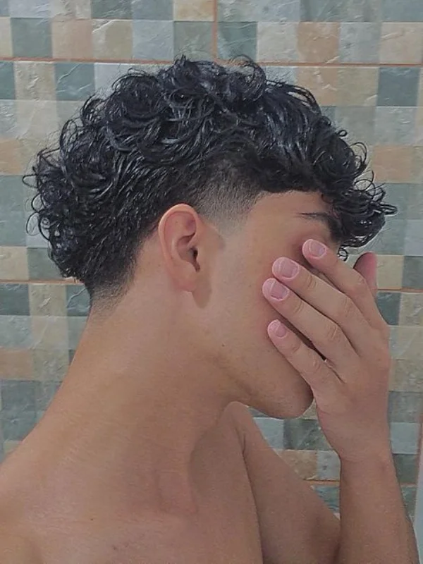 Low Taper Fade with Curls: 20 Fresh Style Ideas for Men 25 Low Taper Fade with Skin Fade Blend