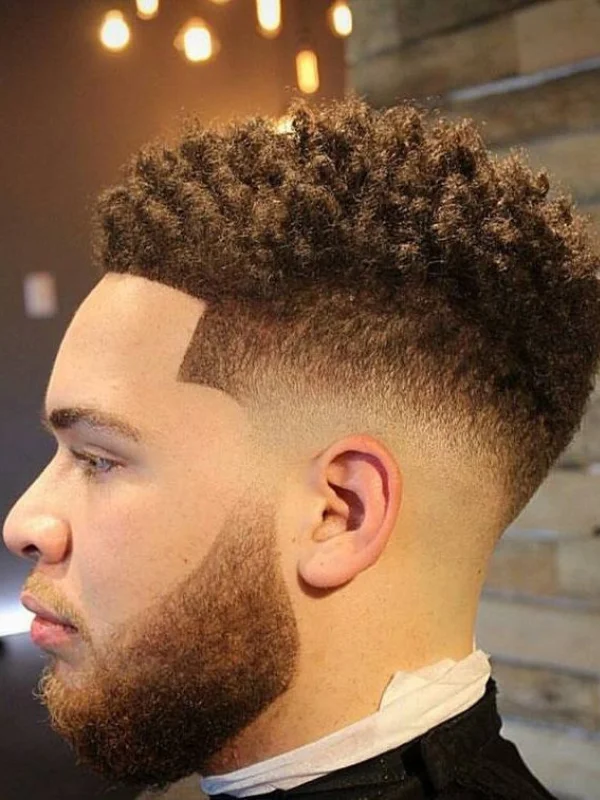 Low Taper Fade with Curls: 20 Fresh Style Ideas for Men 11 Low Taper Fade with Sponge Twist Curls