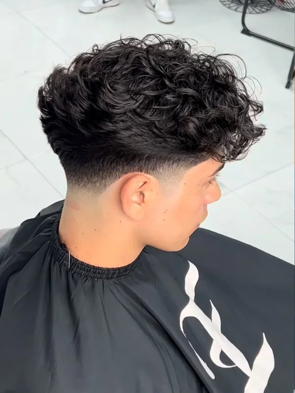 Low Taper Fade with Curls: 20 Fresh Style Ideas for Men 12 Messy Curly Low Taper Fade