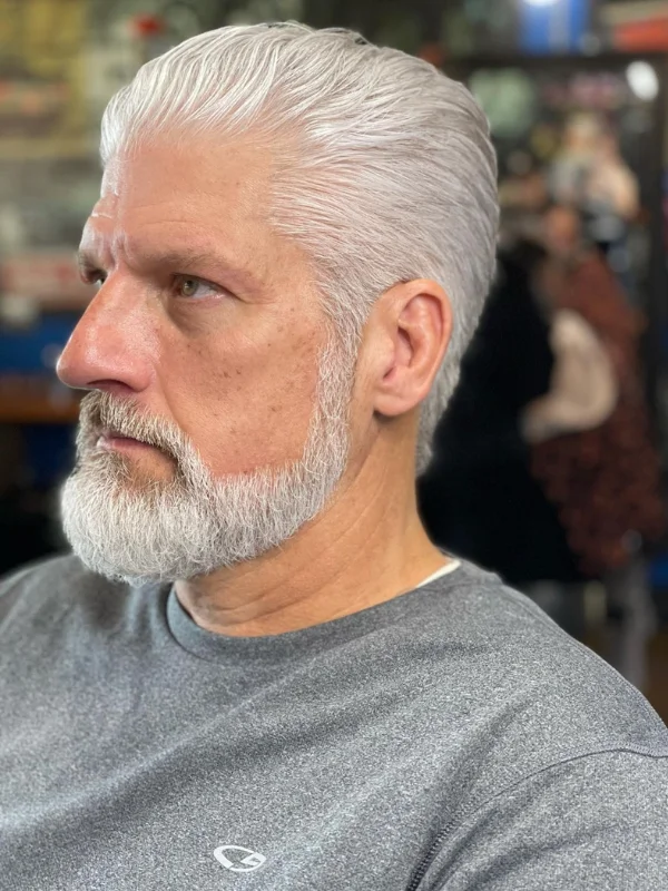 40 Classy and Flattering Hairstyles for Older Men with Thinning Hair 34 Pulled Back and Trimmed Sides Pompadour Classy Older Men’s Hairstyles_ Thinning Hair