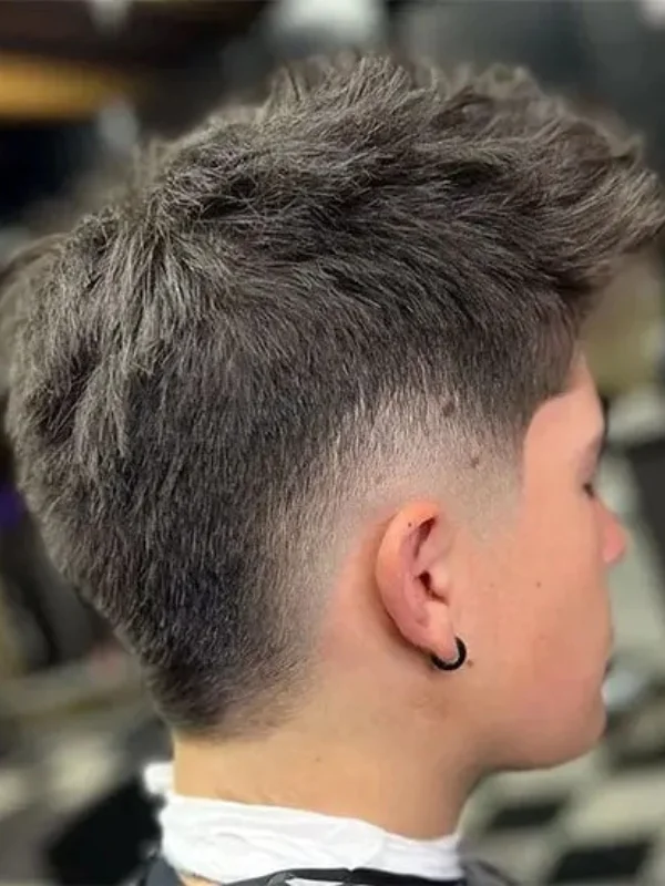 Burst Fade Haircut: 27 Stylish Examples 17 Short Fluffy Hair with Blunt Fringe and Burst Faded Sides